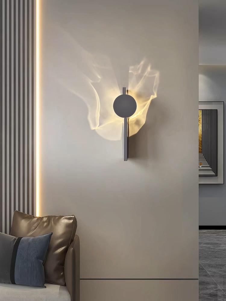 Ripple Rotating Ambient Wall Sconce
