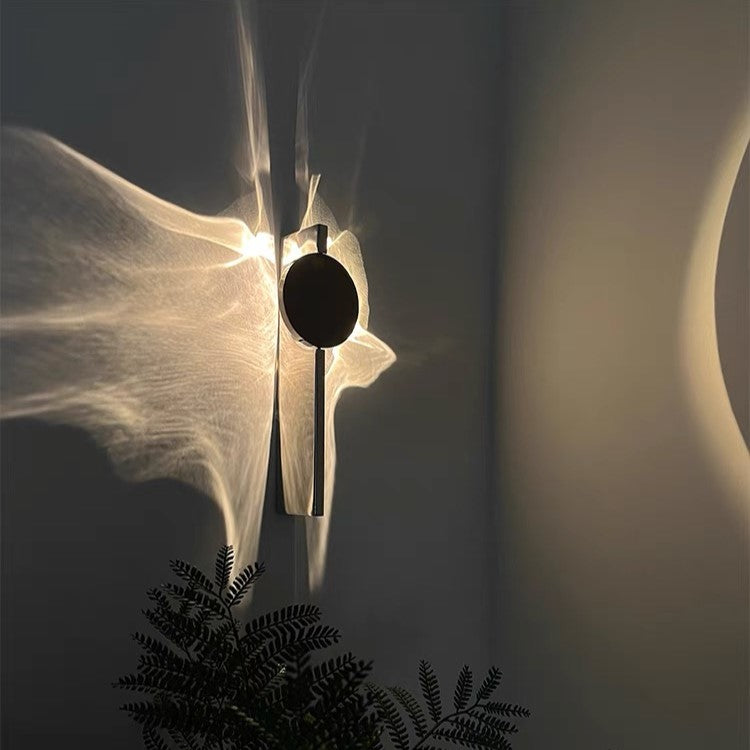 Ripple Rotating Ambient Wall Sconce