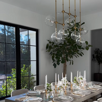 Nordic heldere bolvormige glazen kroonluchter met zwart/gouden afwerking voor eetkamer/keukeneiland
