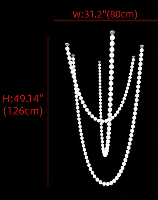 ثريا رايلايت بقلادة من اللؤلؤ