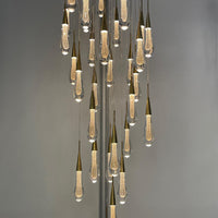 Moderne ronde spiraalvormige kristallen kroonluchter in de vorm van een regendruppel voor trap/hal 