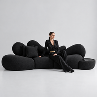 Nocturne Sculptural Bouclé Sofa