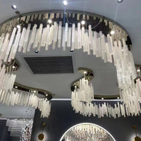 Moderne onregelmatige zwevende holle glazen cilinderkroonluchter voor woonkamer/hotel/restaurant 