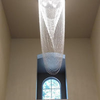 ثريا كريستالية من رايلايت بتصميم شلال مُزخرف بخرز