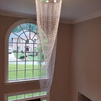 ثريا كريستالية من رايلايت بتصميم شلال مُزخرف بخرز