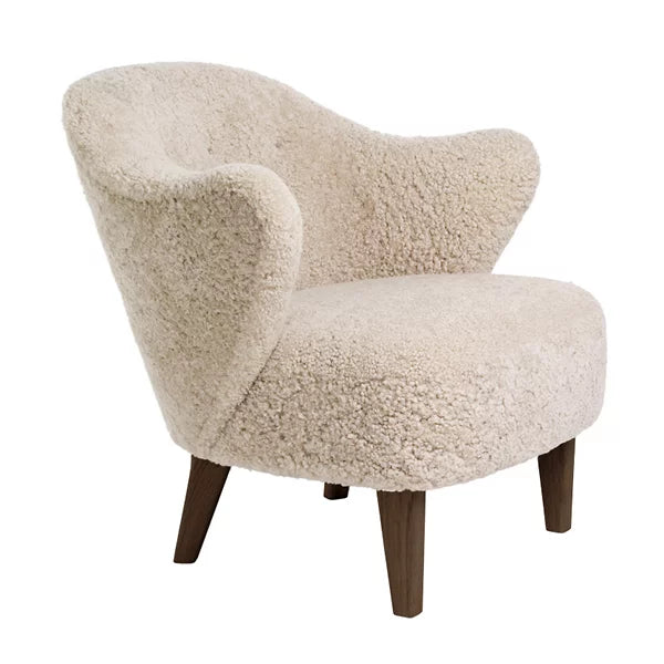 Rylight bank en fauteuil van schapenvacht