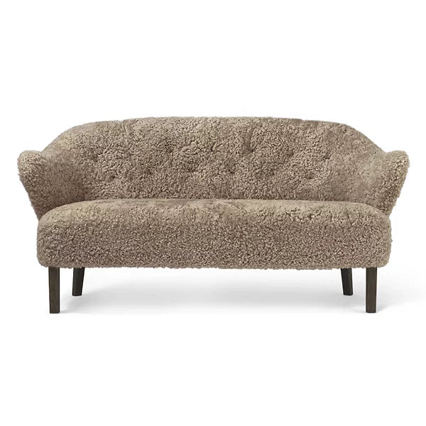 Rylight bank en fauteuil van schapenvacht