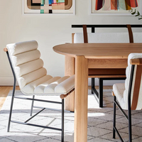 Bouclé/lederen eetkamerstoelen