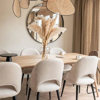 كرسي طعام بلمسة نهائية من القماش بتصميم بسيط حديث