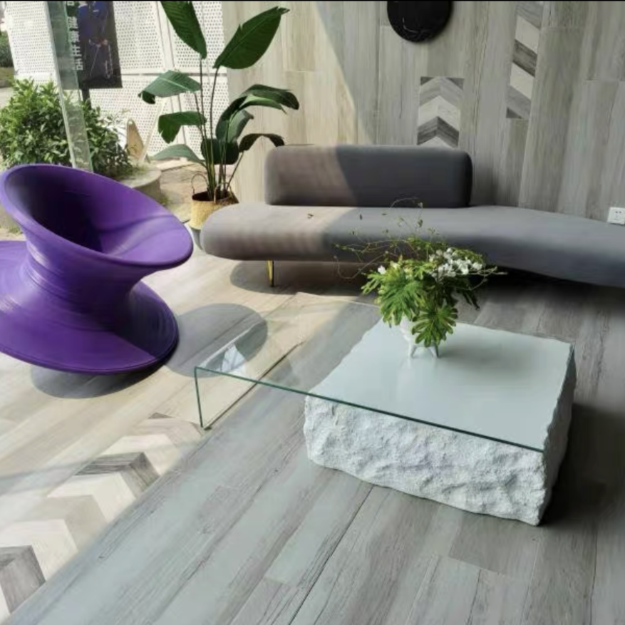 طاولة قهوة حجرية بتصميم فني من رايلايت، سطح زجاجي شفاف