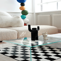 طاولة قهوة حجرية بتصميم فني من رايلايت، سطح زجاجي شفاف