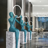 مصباح أرضي على شكل تمثال جالس أسود/أزرق من رايلايت