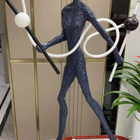 مصباح أرضي LED بتصميم رأس ذهبي من Rylight Art 