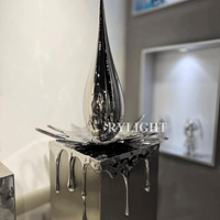Teardrop-Shaped Silver Sculpture Decor