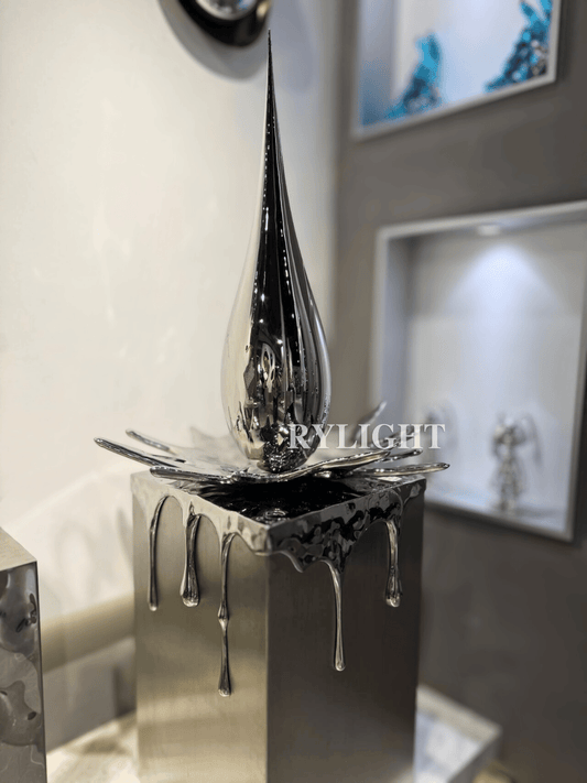 Teardrop-Shaped Silver Sculpture Decor
