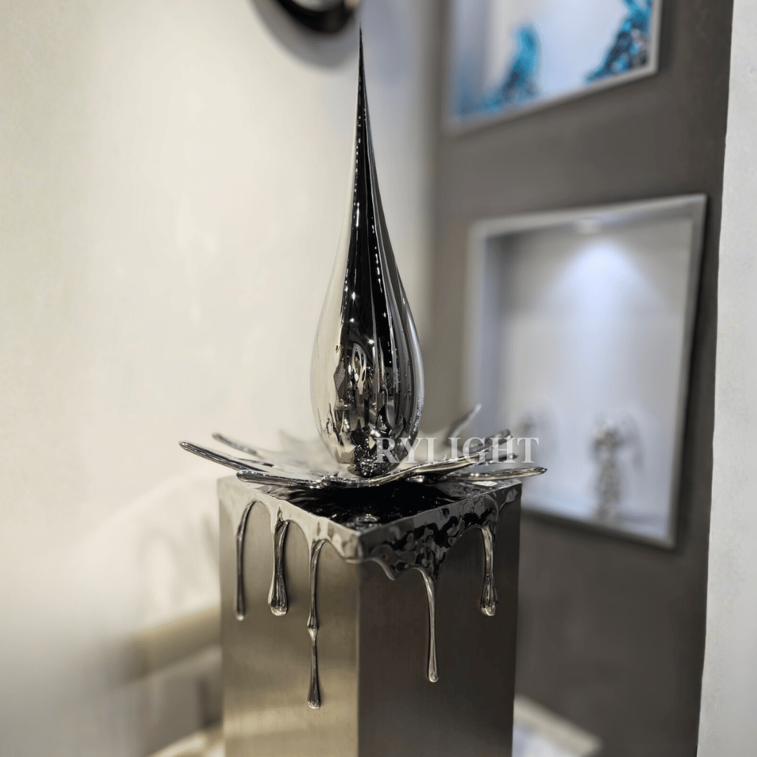 Teardrop-Shaped Silver Sculpture Decor