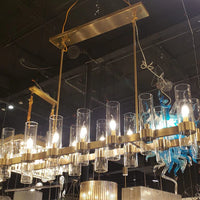 ثريا الشموع ذات الطراز الحديث من Rylight باللون النحاسي/الذهبي