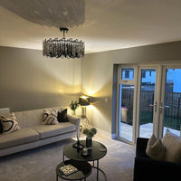 Rylight moderne ronde kroonluchter in zwarte afwerking met rechthoekige kristallen