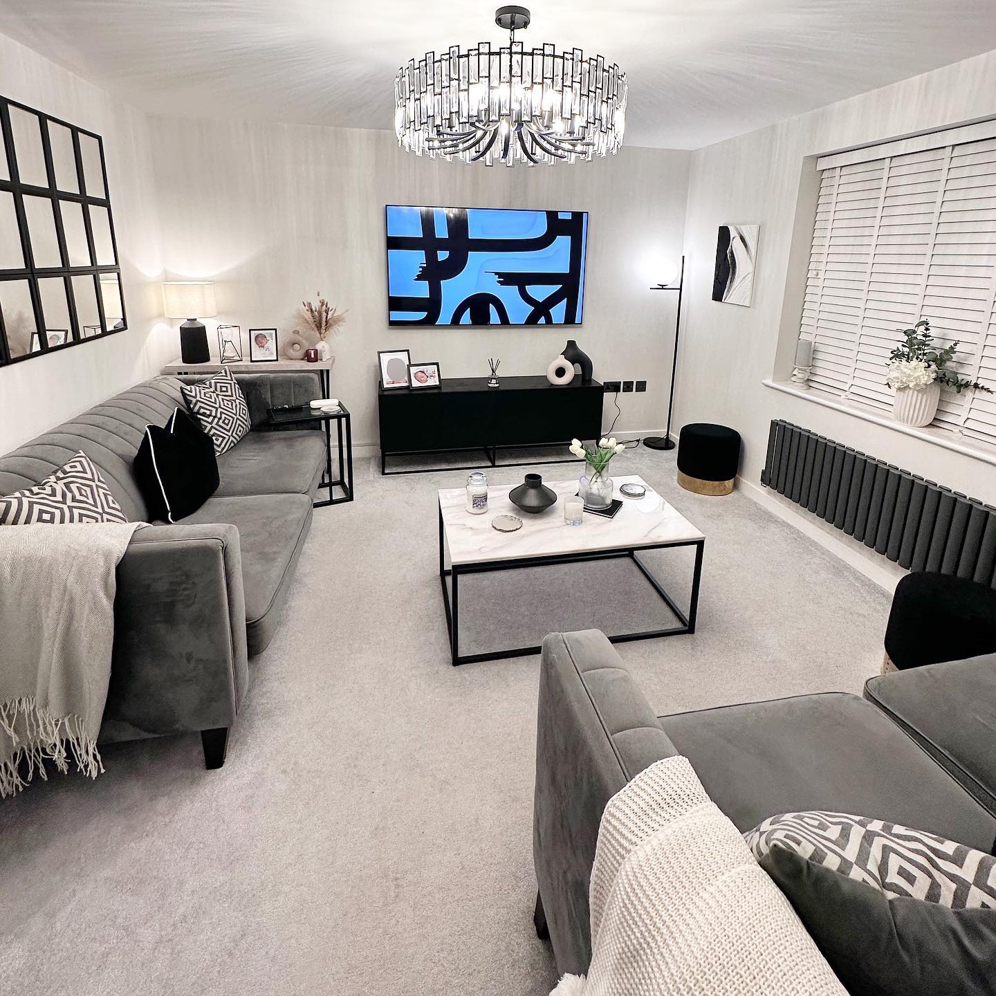 Rylight moderne ronde kroonluchter in zwarte afwerking met rechthoekige kristallen